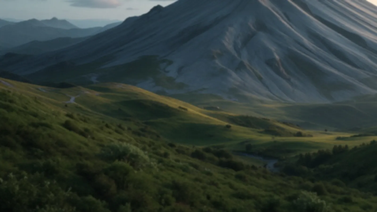 A smooth granite dome mountain above a green valley at sunrise, the FundsGranite view of online loans with fast decisions, $100 – $5,000